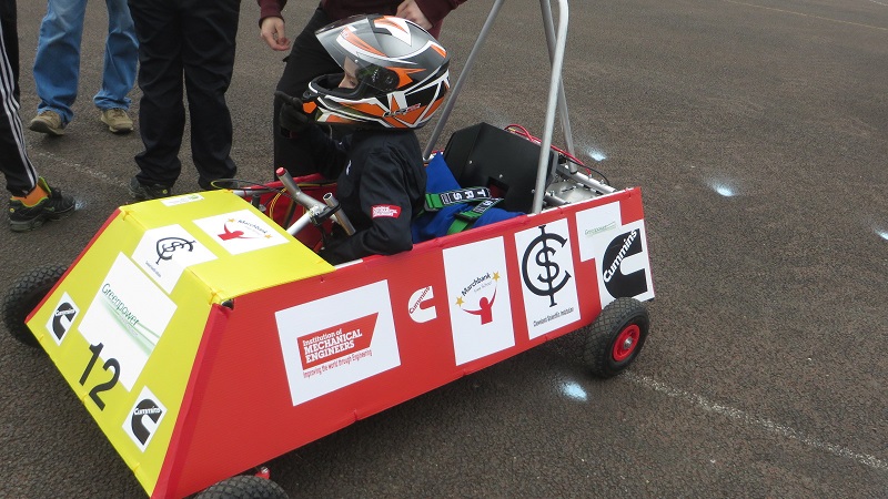 Student in demonstrator car